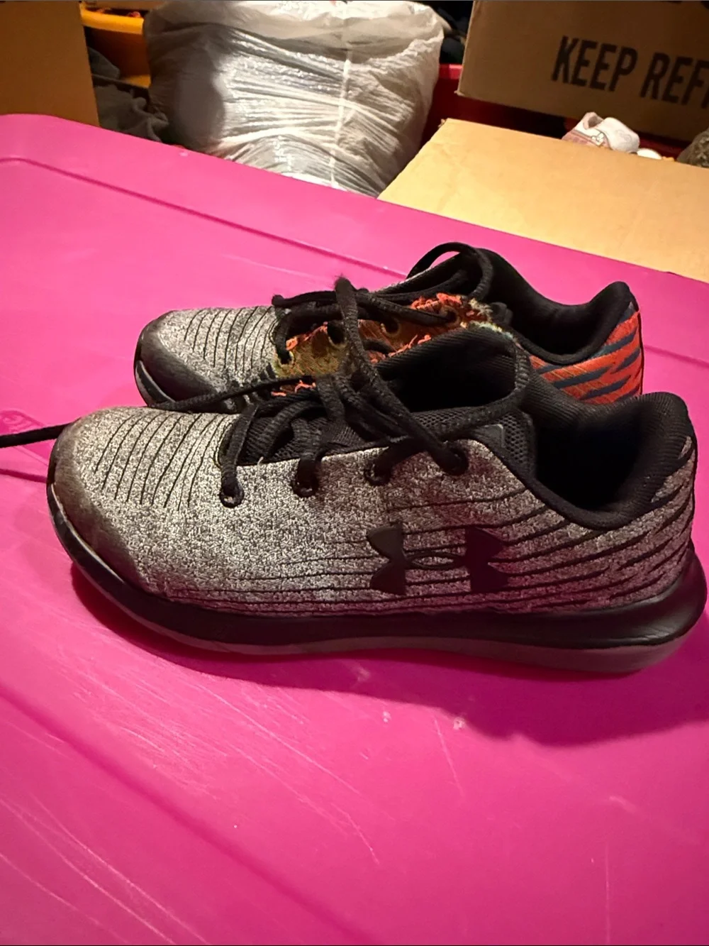 Under Armour Kids' Black and Gray Sneakers with Orange Accent